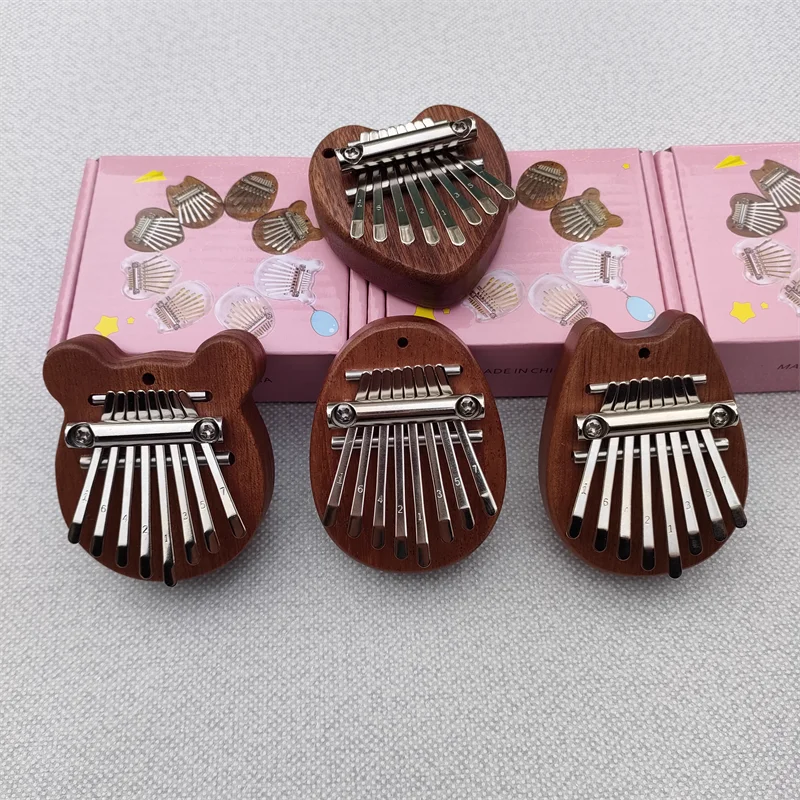 10Pcs Mini 8 Key Thumb Piano Wood Instrument Finger Beginner Tones Musical Exquisite Pendant Gift Set Accessories