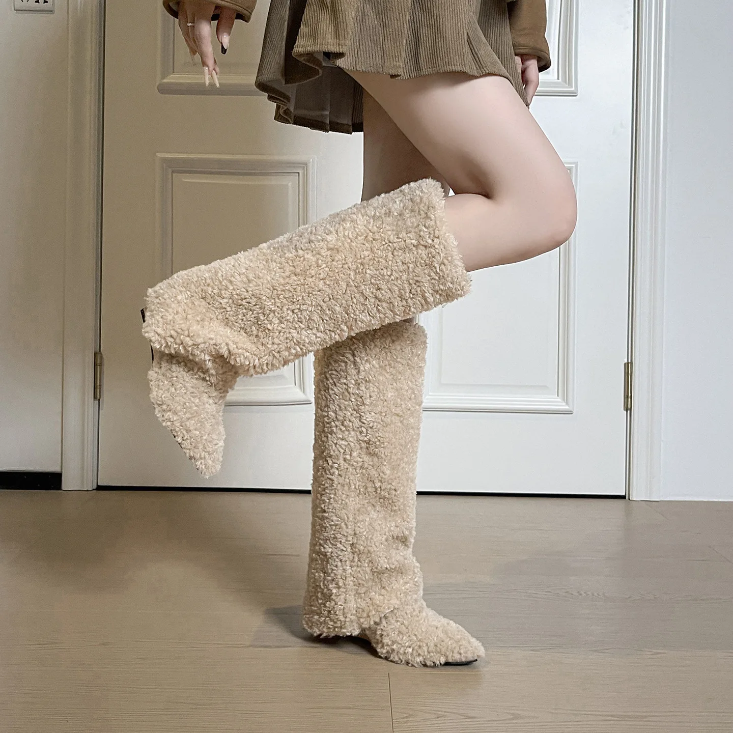 

Long tube boots for women in the autumn and winter of 2026 with added fleece and warm snow cotton boots at the heel