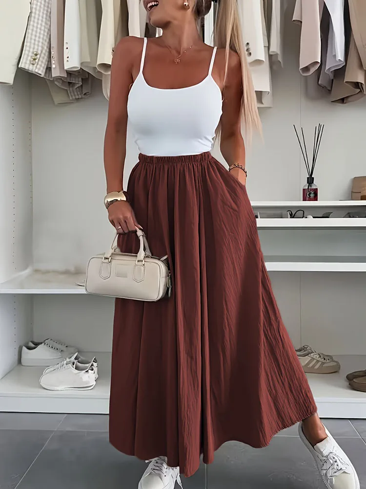 الصيف البوهيمي الشاطئ المرأة تنورة الشارع الشهير عادية بلون مكتب تنانير للسيدات 2025 الربيع عالية الخصر فضفاض ألف خط تنورة