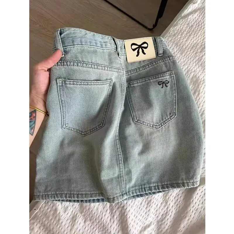 Women's Y2K Light Wash Denim Mini Skirt Low Waist A-Line Jean Skirt with Bow Embroidery and Pockets Casual Women's Clothing