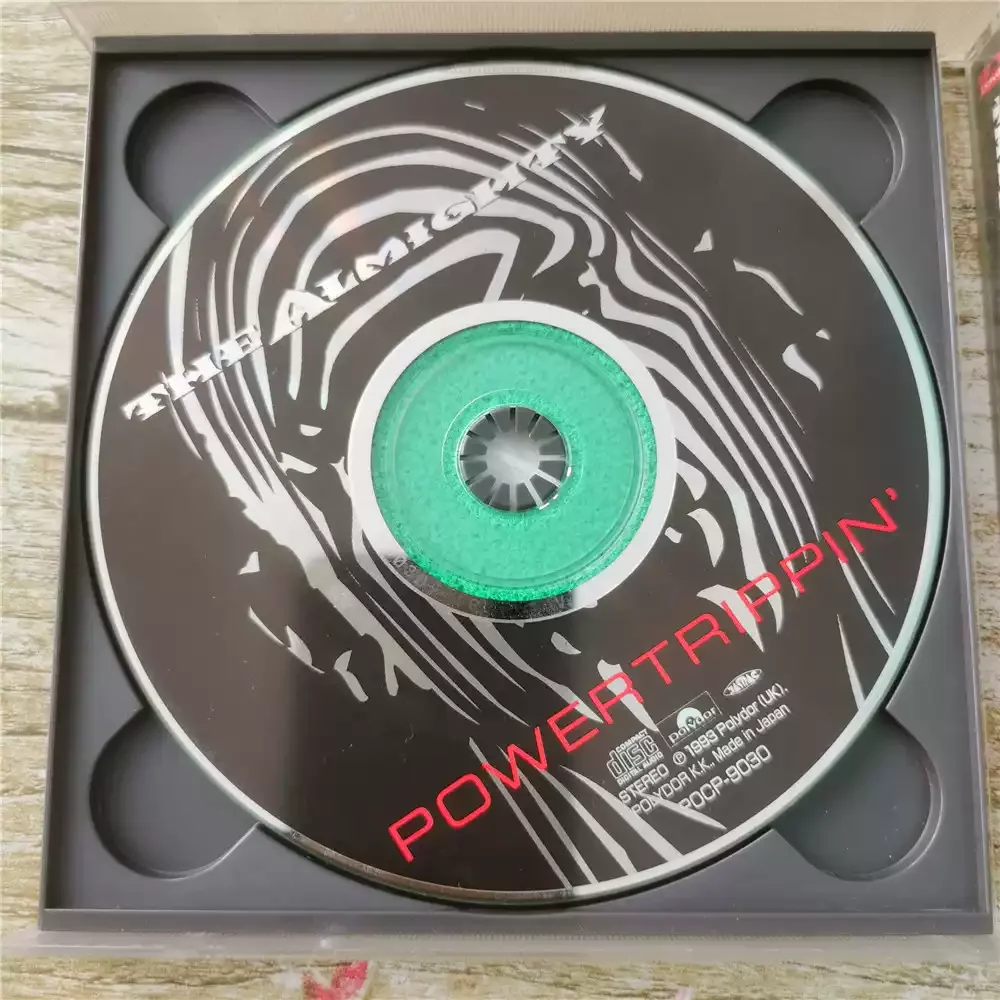 قرص مضغوط The Almighty Powertrippin ألبوم هارد روك/معدني ثقيل تم إصداره فرقة الروك البريطانية The Almighty في عام 1993 #4