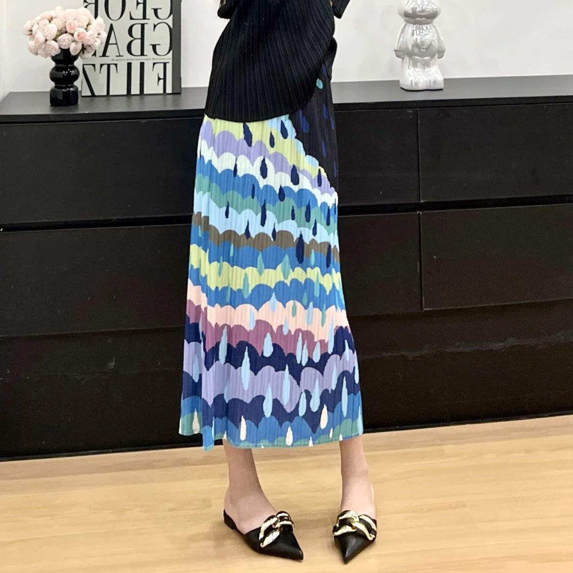 Mezza gonna casual a pieghe Miyake 2025 Estate nuova mezza gonna stampata allentata elasticizzata dal design alla moda