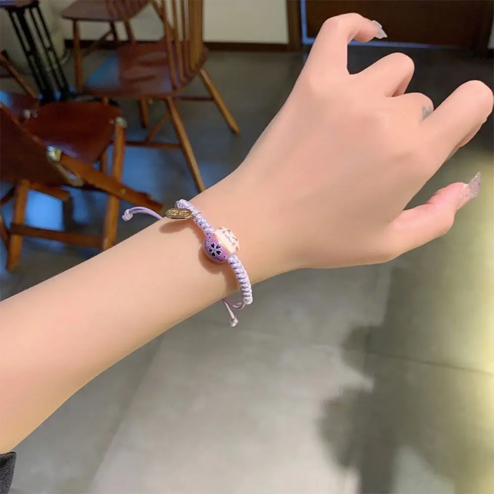 السيراميك القط قلادة Maneki Neko سوار اليدوية اليد حبل أحمر حبل مضفر النمط الصيني مجوهرات اكسسوارات النساء اليد الدائري