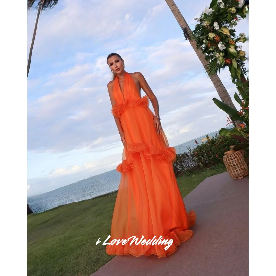 ชุดเดรสออกงานสีส้ม คอวี สายคล้องคอ แขนกุด ระบาย ทรงเอ หลายชั้น ยาวกรอมพื้น จับจีบ ชุดงานแต่งงาน งานเลี้ยง สามารถสั่งตัดได้