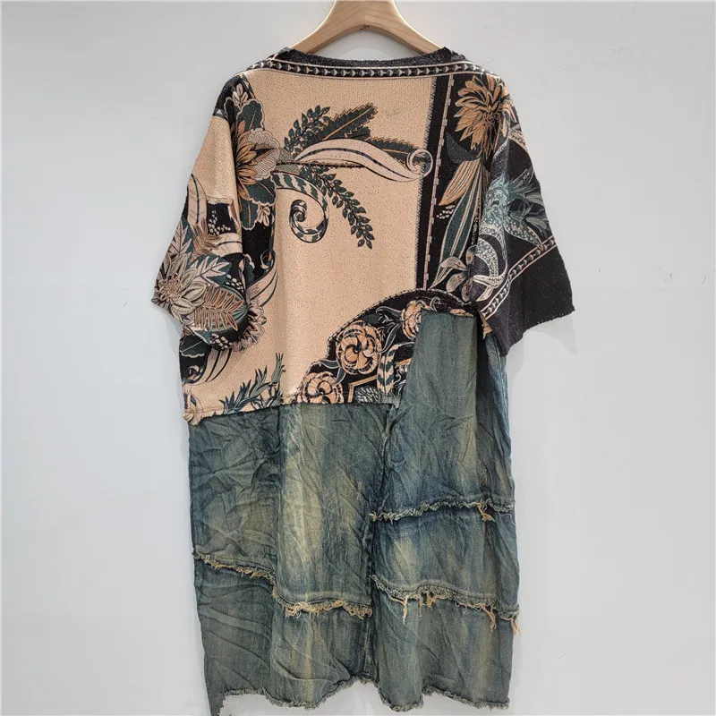 

Knit & Denim Mashup. This 2025 oversized dress features a retro print, short sleeves, and a cool-girl vibe.