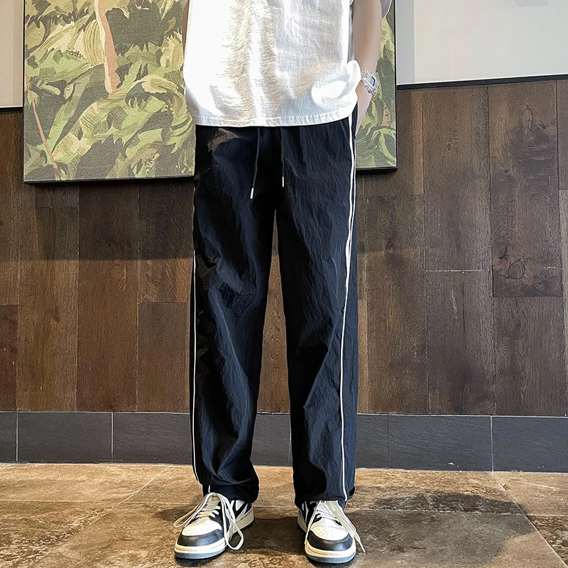 

Men's Loose Straight Leg Sport Pants Quick Dry Foldable Trousers Summer Casual High Street Thin Model Elastic Drawstring
