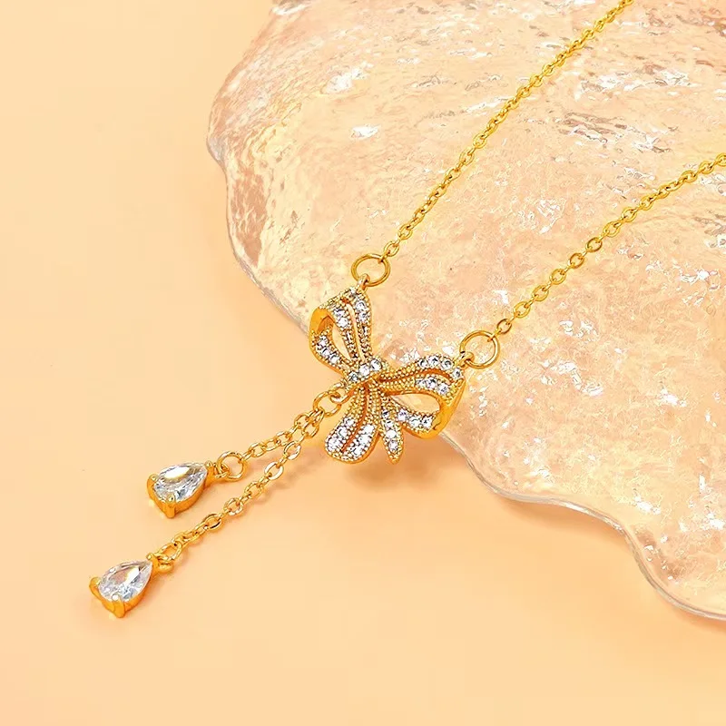 

Light luxury niche full diamond bow necklace, women's water droplets, fairy tears, high-end feeling, collarbone chain