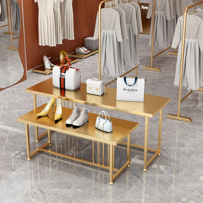 

Стол-витрина для магазина одежды из нержавеющей стали, для демонстрации женской одежды, обуви и аксессуаров в центре.