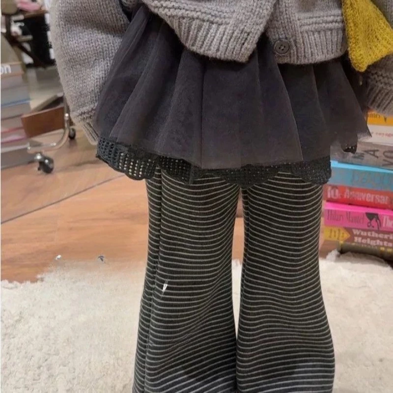 Girls bell bottom pants winter 2026 new baby fake two-piece velvet ballet style striped fart curtain pants baby skirt