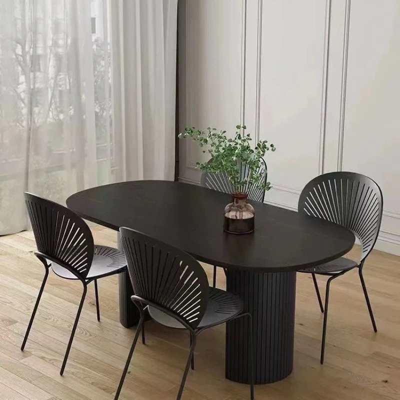 Restaurant black solid wood oval dining table small apartment household light luxury dining table