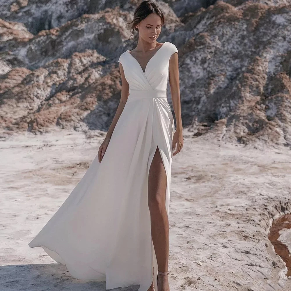 

Simple Modern Boho Wedding Dresses Cap Sleeves Gowns Side Split Bridal V Neckline Back Out Sweep Train