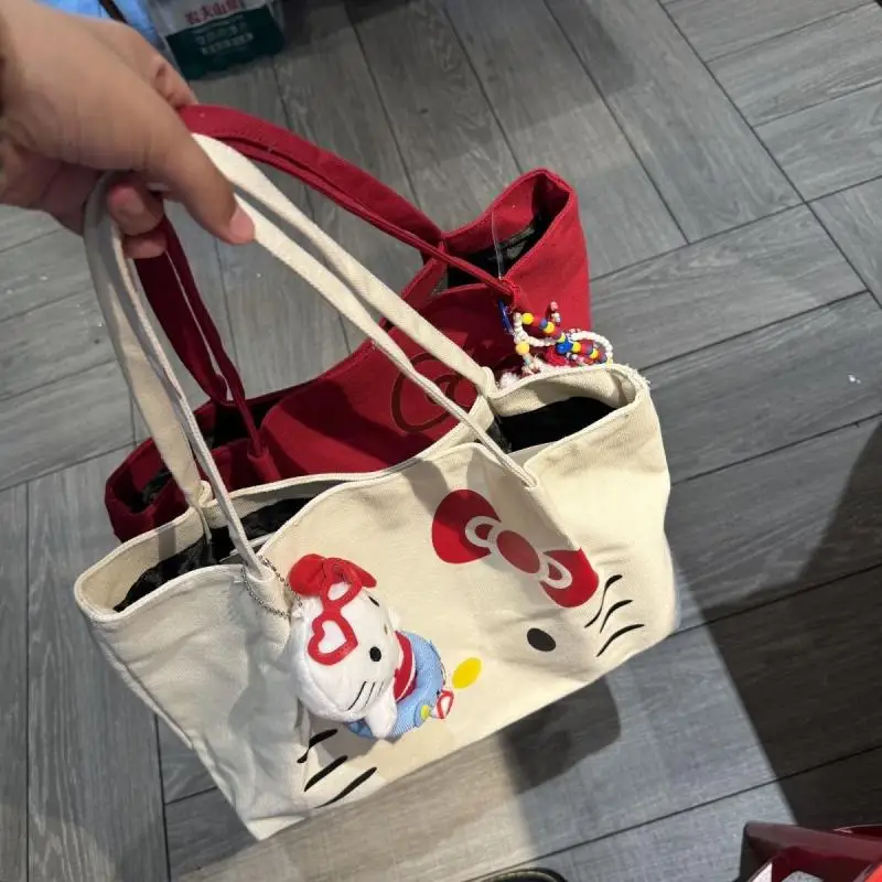 حقيبة كتف سانريو هالو كيتي للركاب مطبوعة برسوم كارتونية حقيبة يد كاواي ذات سعة كبيرة هدية عيد ميلاد محمولة للفتيات