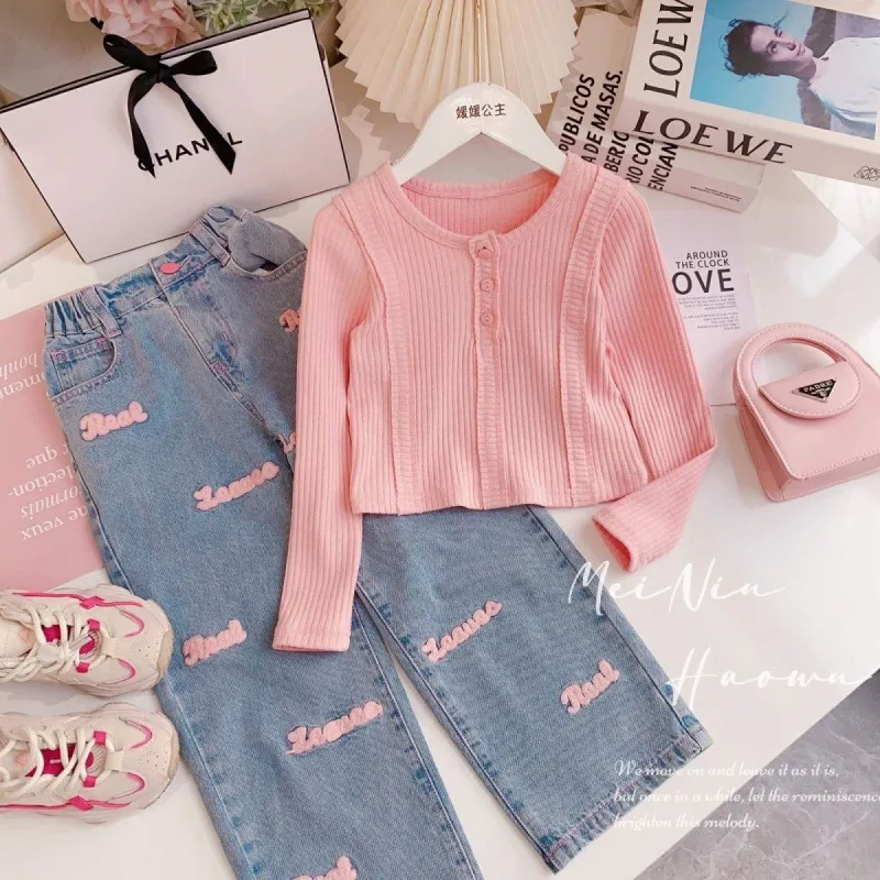 

Girls' Spring Outfit2026New stylish long-sleeved round-neck waist-cinching top and jeans two-piece set for girls