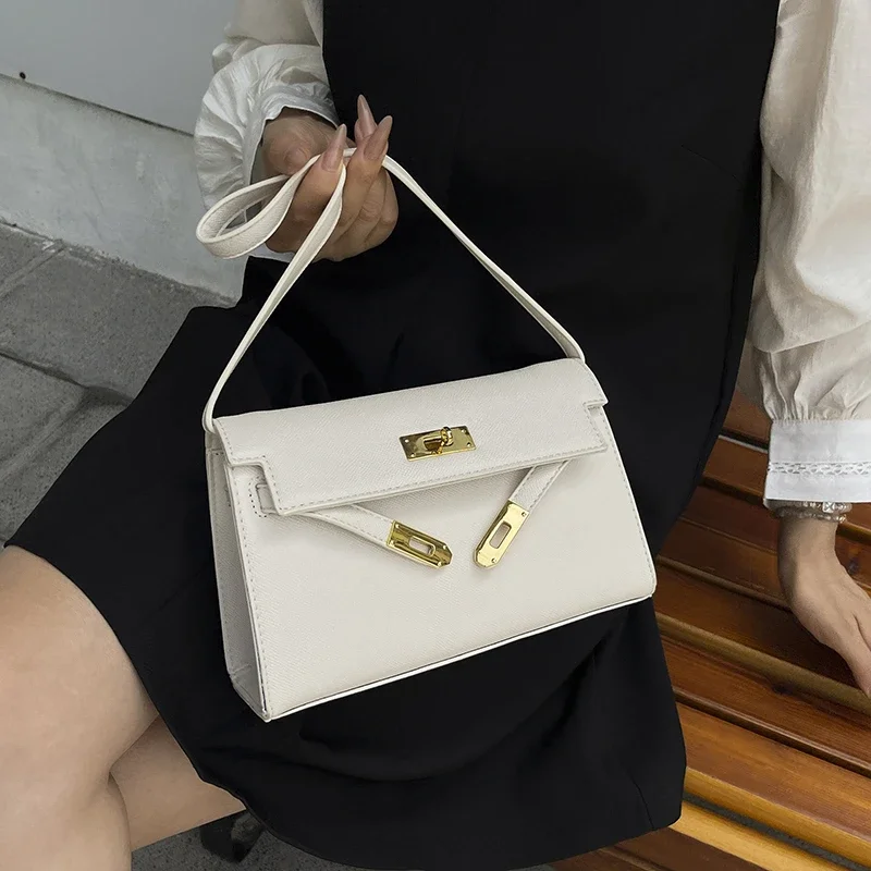 Borsa a tracolla a tracolla elegante alla moda classica in pelle di lusso da donna. Elegante borsa tote di design per il pendolarismo quotidiano