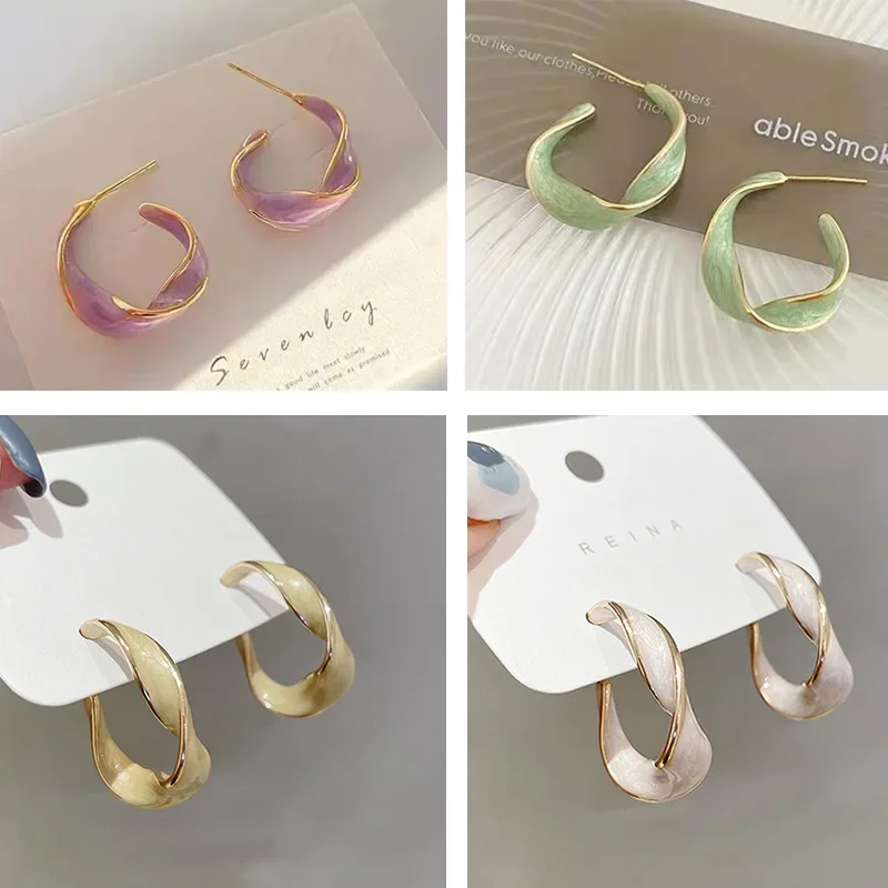 Silver needle twisted dripping oil C-shaped earrings retro simple design sense fashion earrings cold wind earrings women