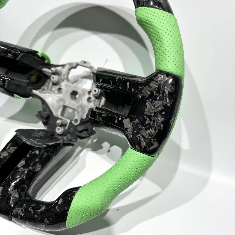 Carbon fiber steering wheel for Ford Mustangs manufactured before 2014, customization available, direct from manufacturer. view 2