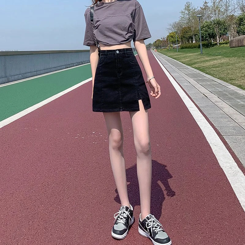 Thin section summer black denim skirt female bustier elastic high-waisted open fork anti-glare a word package hip pants skirt