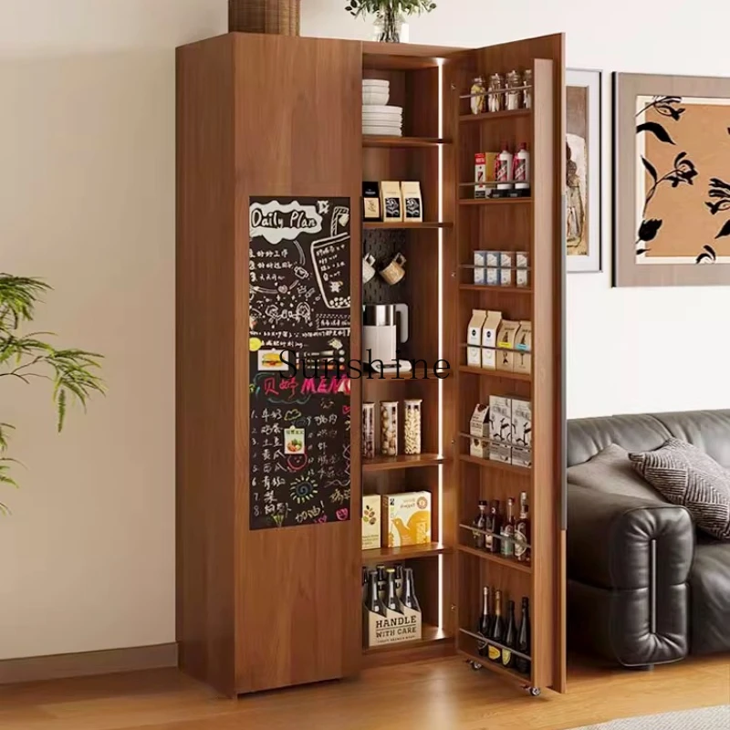 

Medieval style dining side cabinet against the wall embedded in the integrated cabinet above the refrigerator