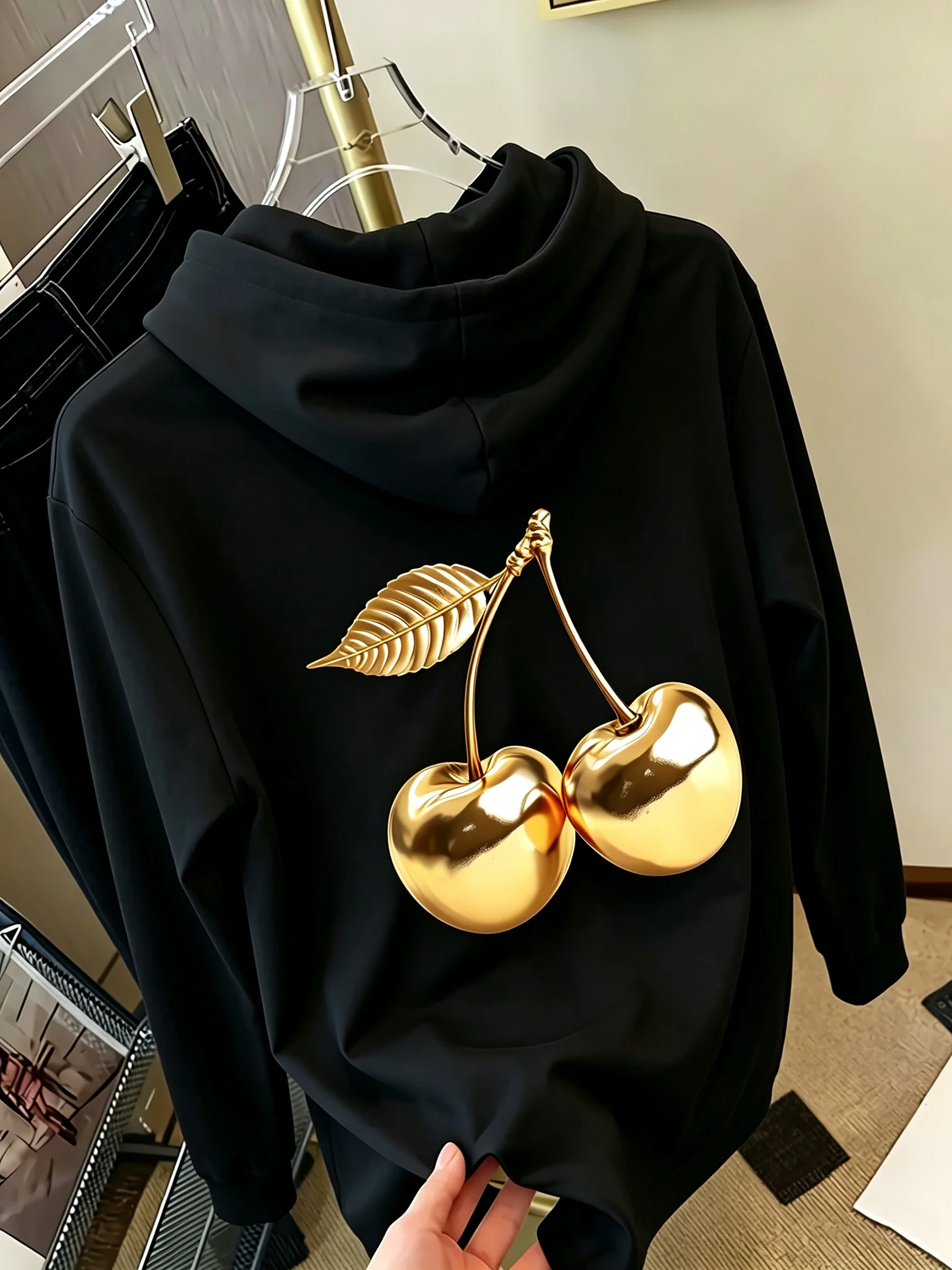 Golden cherry printed women's hoodie - fashionable casual top with elegant style. Multi-purpose and simple design for women tops