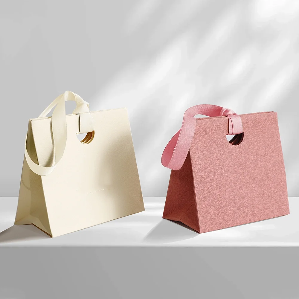 Hochwertige Papierhandtasche Exquisite Schmuck-Geschenktüten mit Griffen Party-Gastgeschenk-Verpackung Papiertüte Geburtstags- und Hochzeitsgeschenktasche