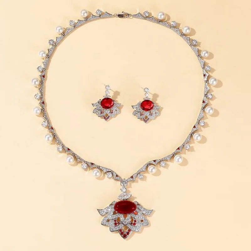 

Дизайнерская коллекция, модные элитные ювелирные изделия, женские женские инкрустации, циркон, красный камень, кулон, синтетический жемчуг, ожерелье, серьги