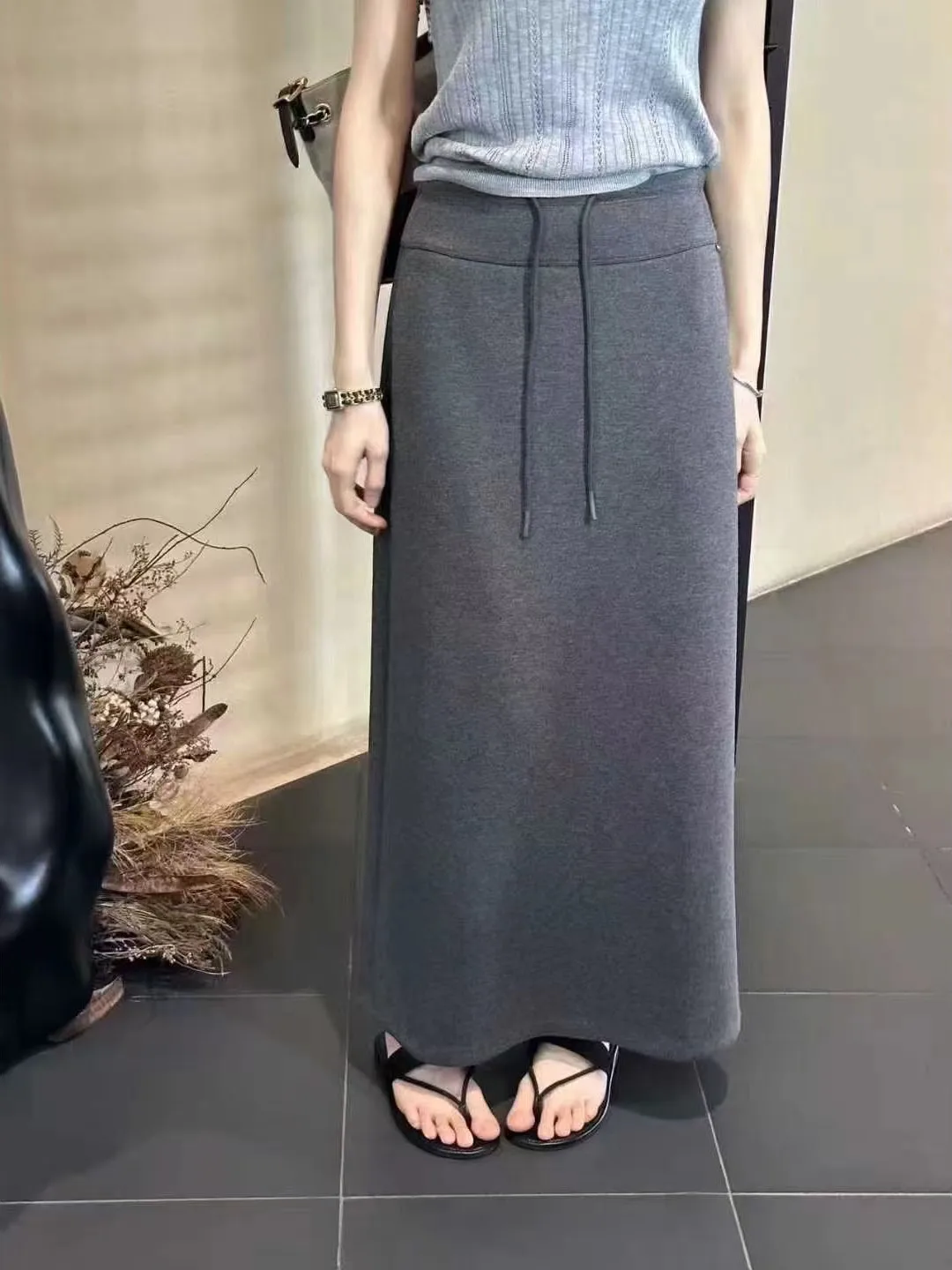 أوائل الخريف 2025 المرأة عالية الخصر مستقيم قطع تنورة الكورية Sle Dstring با سبليت عادية التخسيس تنورة طويلة