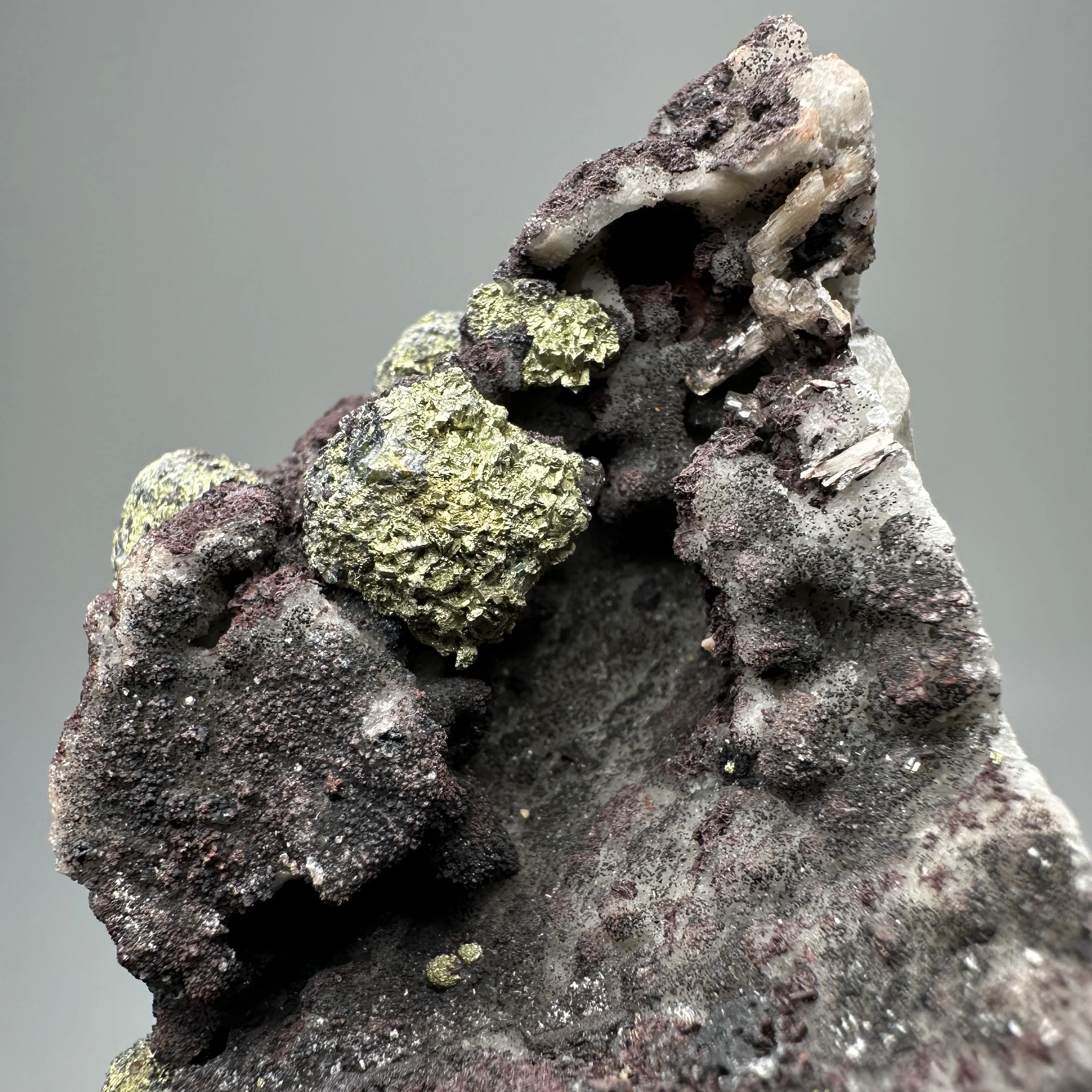 Natural brass ore is found in association with red crystal Crystal mineral specimens as home decoration items