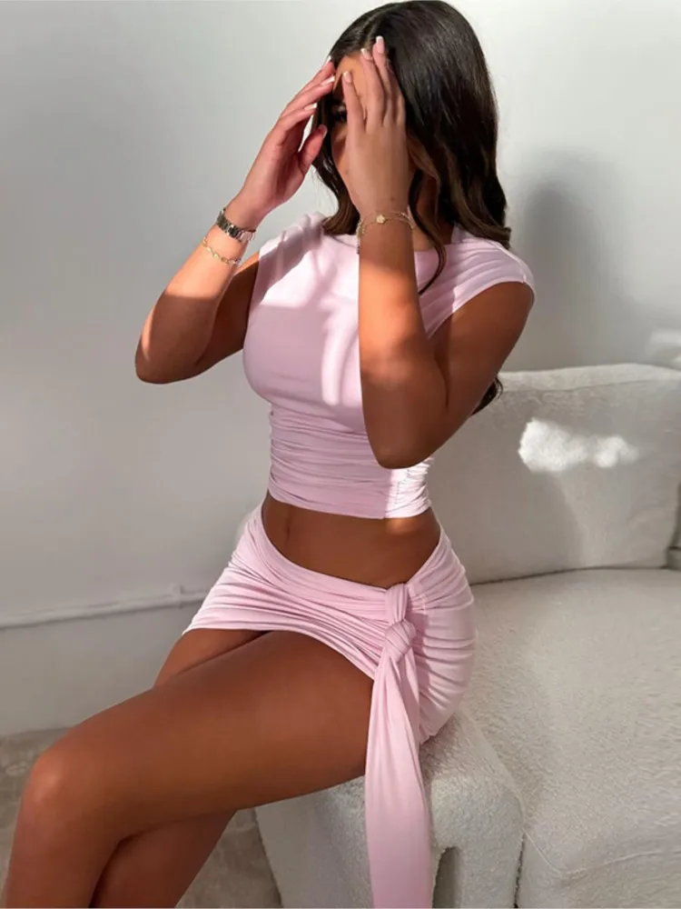 여름 솔리드 컬러 Pleated 2 조각 세트 민소매 라운드 넥 Backless 섹시한 자르기 탑 & 미니 스커트 여성용 저녁 파티 세트