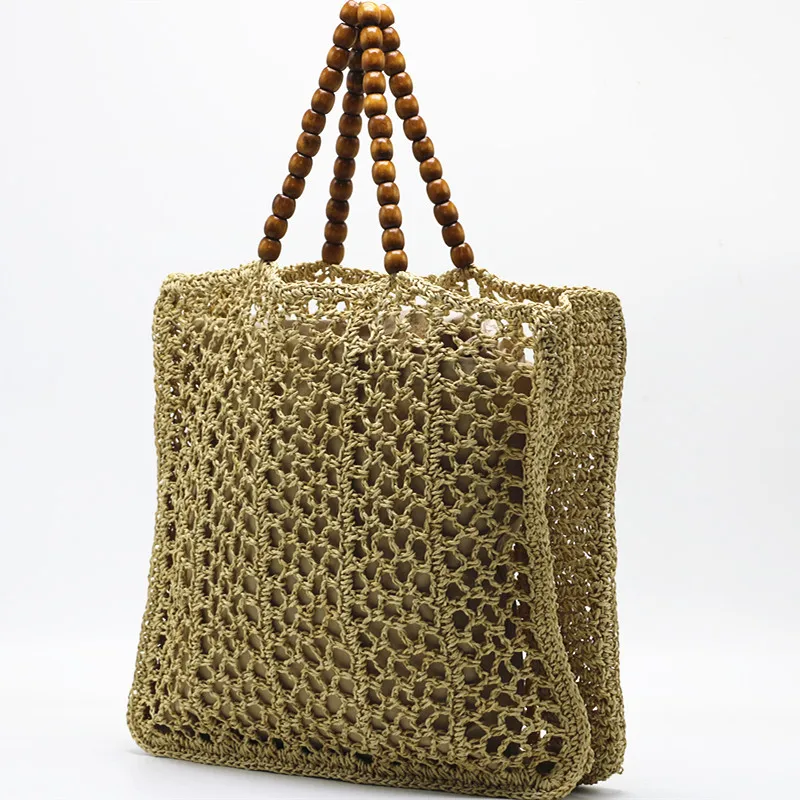

Bohemian Hollow Woven Bag Beading Handle Handbags Summer Straw Bag Bali Travel Rattan Bags for Women 2023 Shoulder Bags Shopper