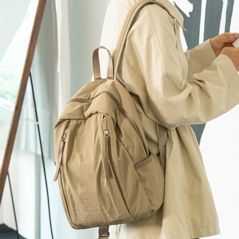 Zaino da viaggio semplice in tinta unita Zaino leggero multitasche in nylon Zaino da studente di grande capacità in stile coreano da uomo