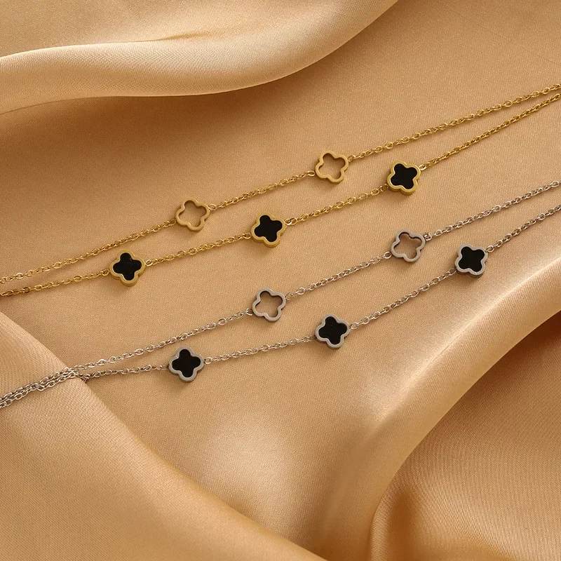 

Высококачественный нишевый 102Новый двухслойный полый четырехлистный браслет, женские универсальные украшения