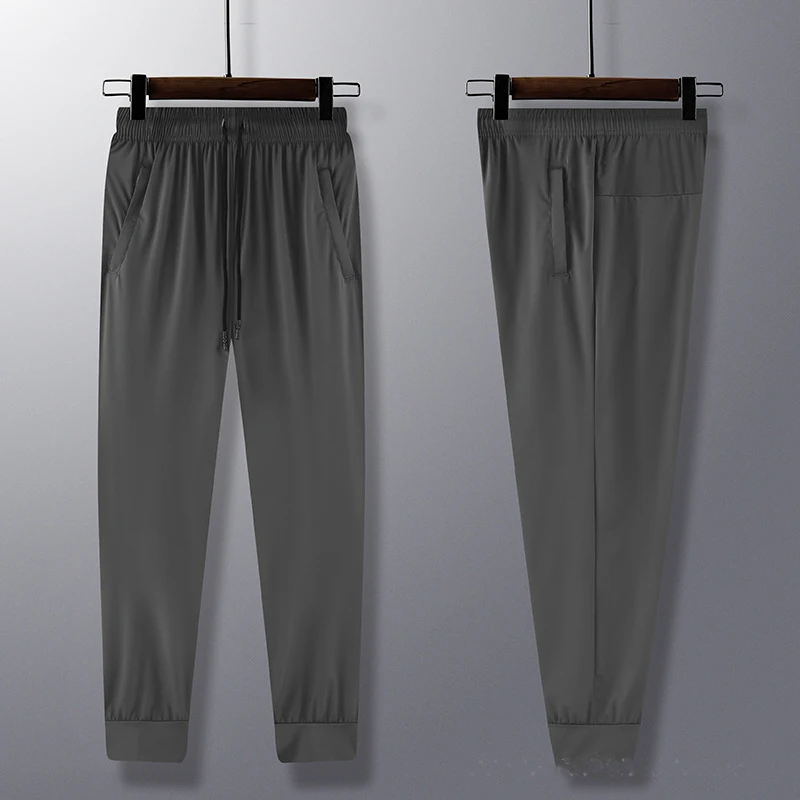 السراويل البضائع Sweatpants الرجال الرياضة تشغيل السراويل سستة رياضي كرة القدم كرة القدم التدريب مرونة يغطي الرجل الركض الصالة الرياضية السراويل