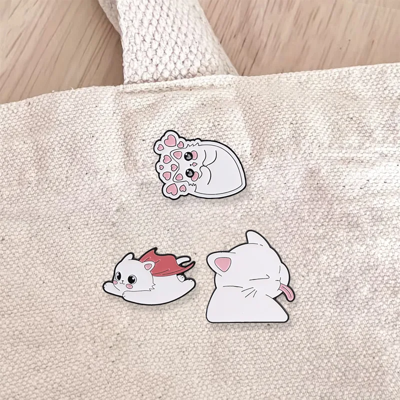 Lovely Expression White Kitten Enamel Pin Heart Paw Cloak Hero Teasing Tongue Cat Brooch Lapel Badge Jewelry Gifts