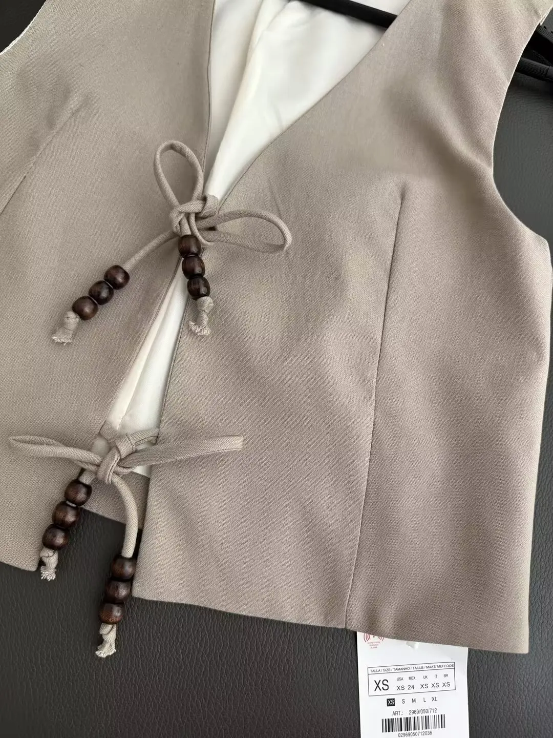 Gilet décontracté en lin mélangé pour femmes, manteau à col en V rétro, haut chic boutonné, décoration de nœud de perles, nouvelle mode, 2024