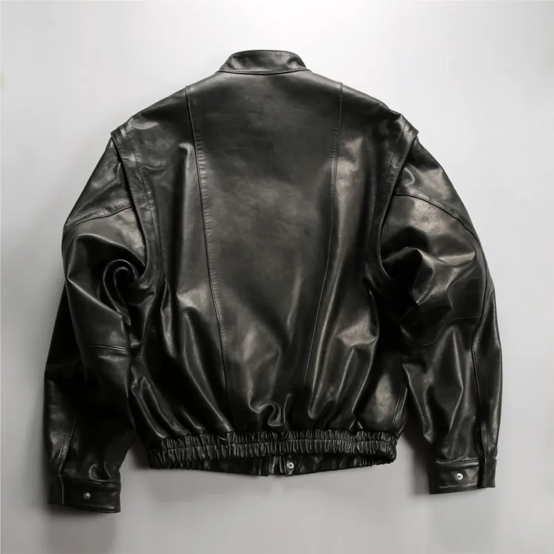 Two men wear leather with detachable sleeves vests and