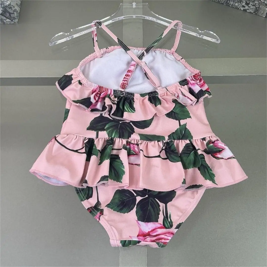 2025 nieuwe roze meisjesbadpak meisjes bikinizwempak met bloemenprint uit één stuk sling-badpak kwaliteit kinderzwemkleding