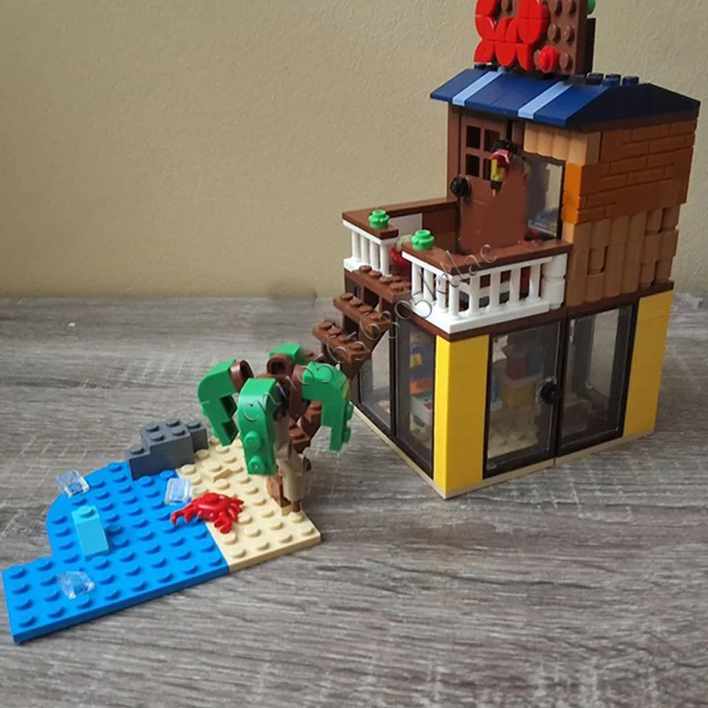 บ้านติดตั้งบนถนนริมชายหาด 231 ชิ้น ชุดตัวต่อแบบโมดูลาร์ MOC ปรับแต่งได้ รุ่นยอดนิยม ประกอบง่าย สร้างสรรค์ ของเล่น DIY ของขวัญ