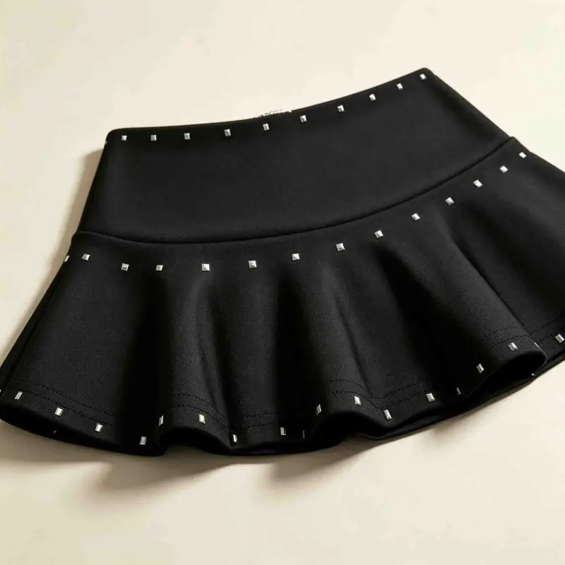 Spicy girl style rivet decoration short skirt, summer low waist slimming A-line lotus leaf pleated short skirt