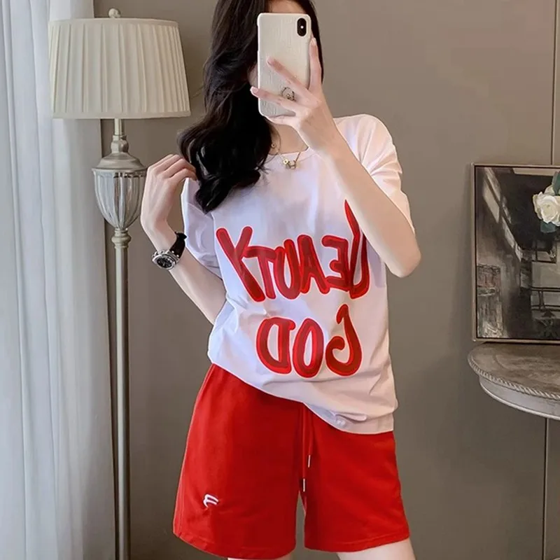 

Trendy Womens Summer Short Set Oversized Graphic Tee with Comfortable Red Shorts Casual and Chic Two Piece Outfit