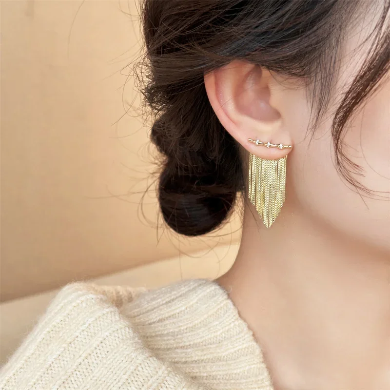 Golden bamboo long tassel earrings light luxury high-end studs 2024 new unique temperament New Year's earrings women