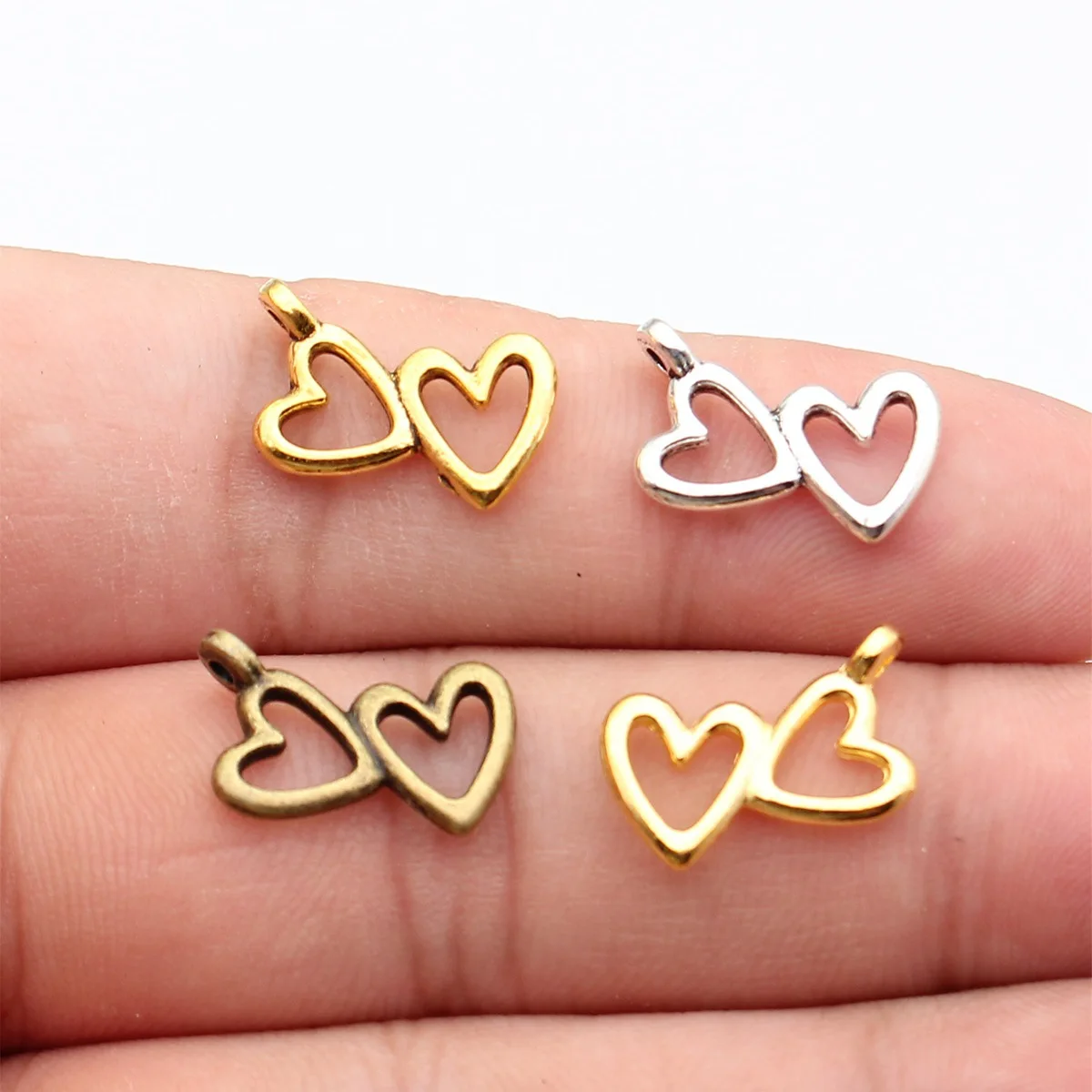 20 piezas, 18x16mm, encantos huecos de corazones dobles, encantos de corazones dobles