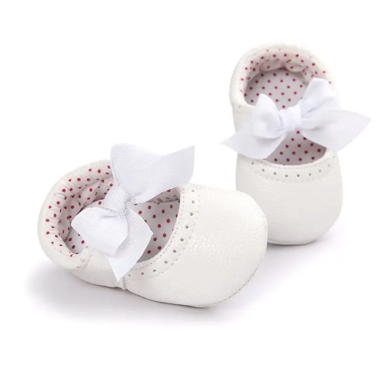 Zapatos de piel sintética para bebé recién nacido, zapatos de princesa con lazo, antideslizantes, suela suave, primeros pasos, 0 a 18 meses