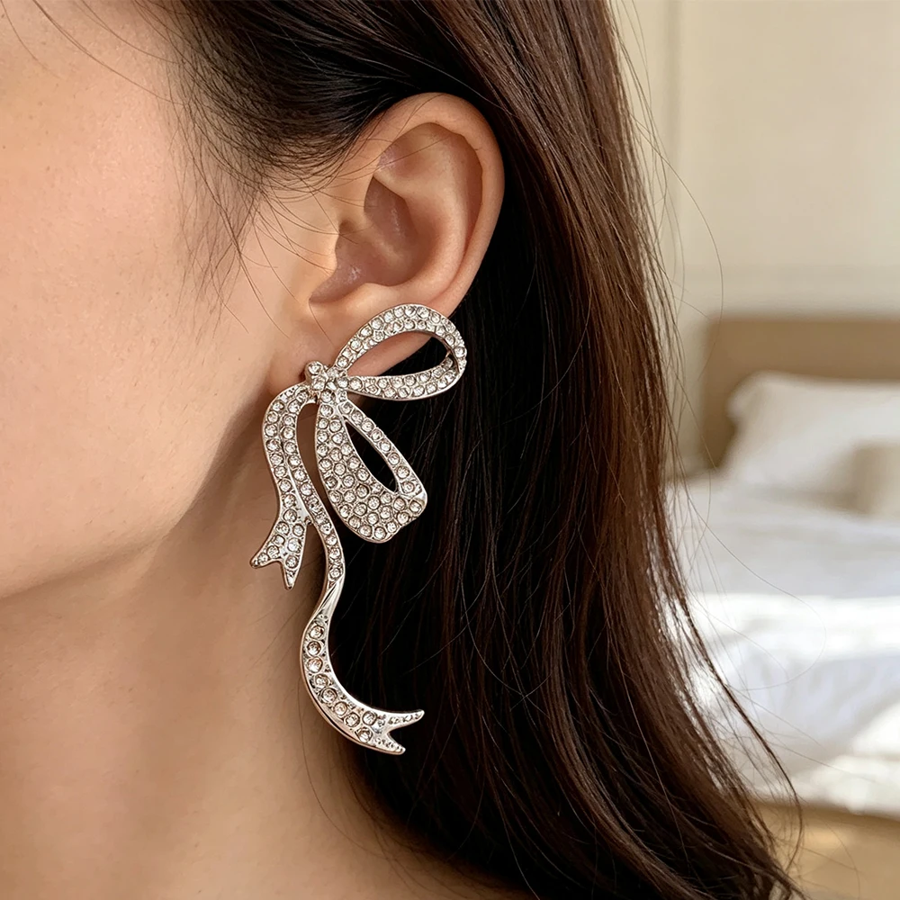 Silver-Colored, Fully-Encrusted Rhinestone Earrings with an Elegant Ribbon Bow Design, Suitable for Parties, Weddings, Dates, and Other Occasions