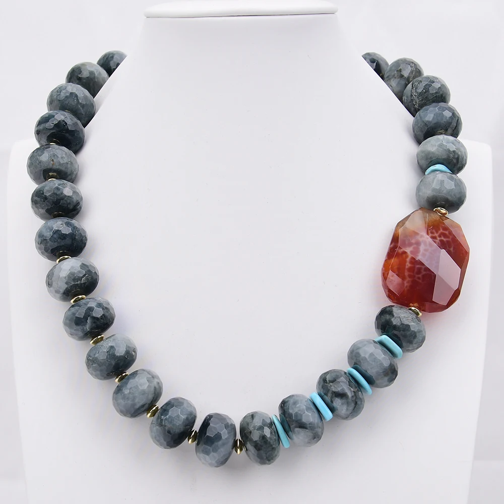 

Ожерелье G-G 20 мм с крупными натуральными серыми камнями «Орлиный глаз» и оранжевыми срезами африканского огненного агата