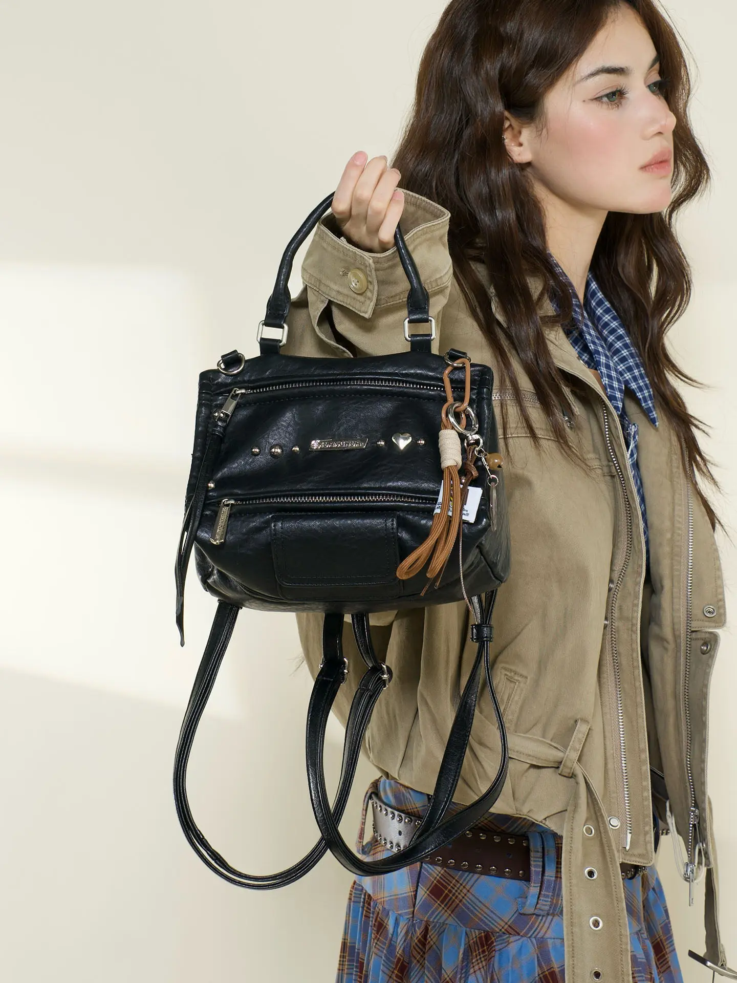 European And American Fashion Motorcycle Style Metal Rivet Decoration Multi Pocket Compartment Design Personalized Mini Backpack