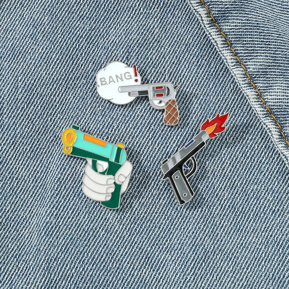 Gun Enamel Pins Revolver Pistol On Fire Bang Armed Brooch Lapel Badges Weapon Jewelry Gift for Friends