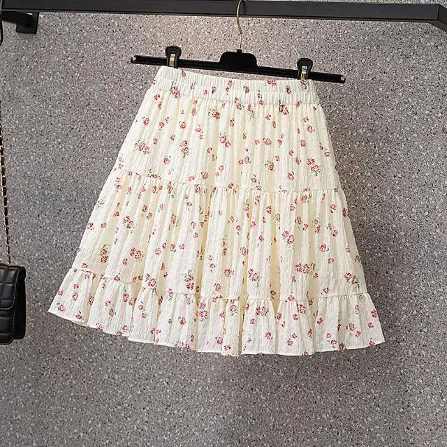 Falda ajustada Floral para mujer en primavera y verano, nueva falda coreana versátil para pastel, Falda corta holgada de cintura alta con volantes
