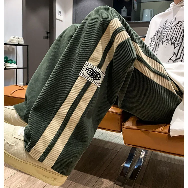 Pantaloni di velluto a coste coreano pantaloni casual all-match a gamba dritta di tendenza da uomo più pantaloni larghi a gamba larga addensati in