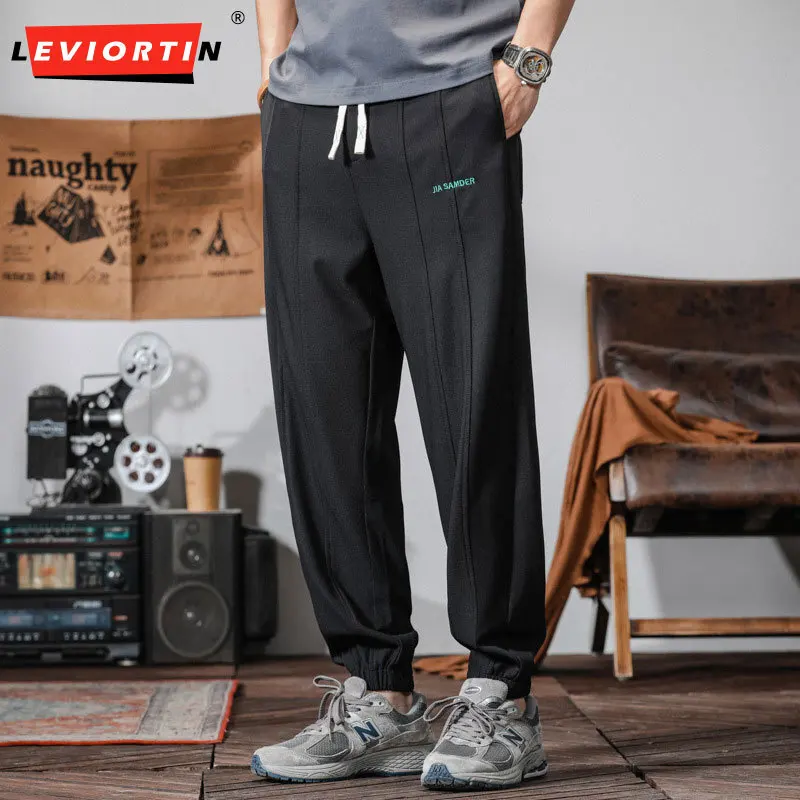 

Men's summer fashion Korean version youth versatile casual simple embroidery design solid color ankle binding sports pants