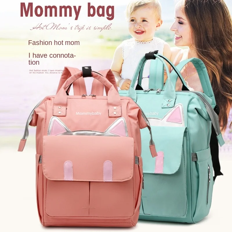 

New fashion mom mother mother backpack student bag carrying shoulders large capacity multi-functional back can be lifted